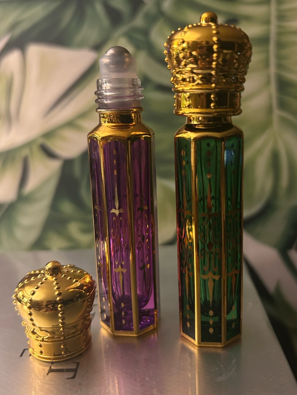 Ornate glass rollerball perfume container